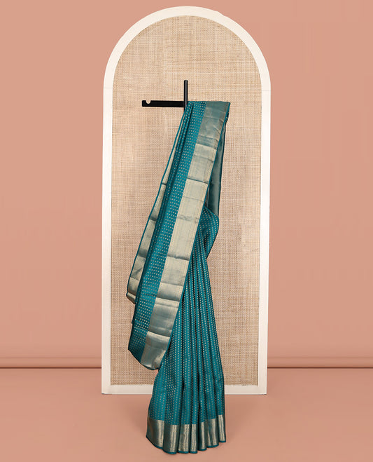 Blue Vasundhara Lite Silk Mix Saree, Embellished with Zari Buttas All Over Its Body, Highlighted by a Zari Border of Rettai Neli, Poun, Banaras, Manga, and Mayil Kann Designs, Grand Pallu, and Paired with a Matching Blouse