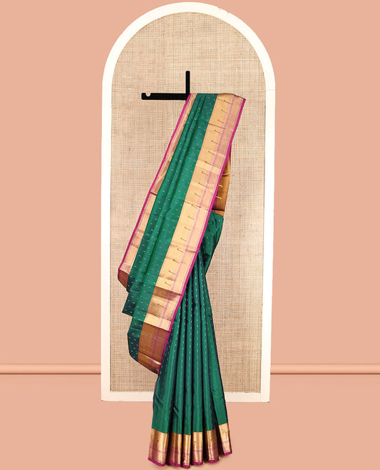 Green Vasundhara Lite Silk Mix Saree, Woven with Zari Buttas, Complemented by a Contrast Zari Muniya Border, Grand Pallu, and a Contrast Blouse