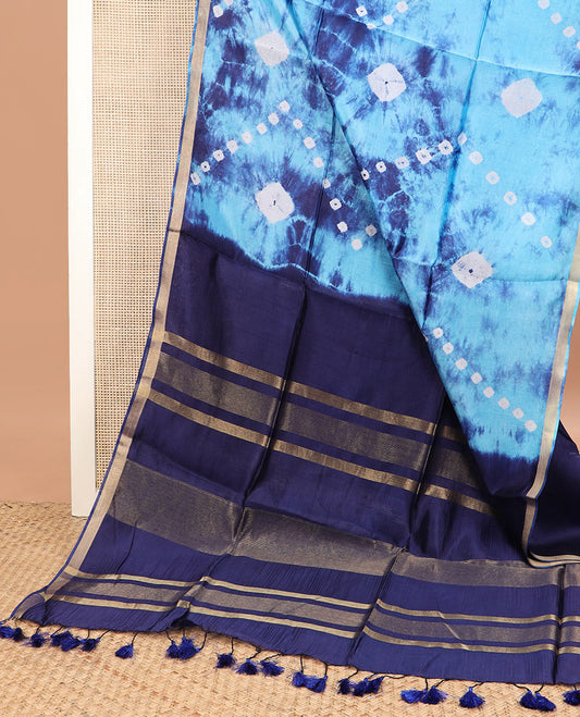 Blue shibori printed banana pith saree, zari piping border, and zari striped pallu