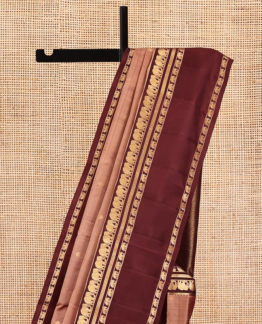 Peach Vasundhara Silk Saree, Adorned with Zari Buttas All Over Its Body, Complemented by a Contrast Rettai Pettu Border of Yaanai Designs, Grand Jaal Pallu, and Paired with a Contrast Blouse