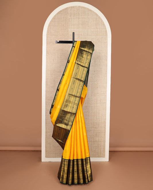 Yellow zari buttas silk saree, contrast border of rekku,mayil,paiyadi kann,banaras,vanki & kamalam & jaal pallu