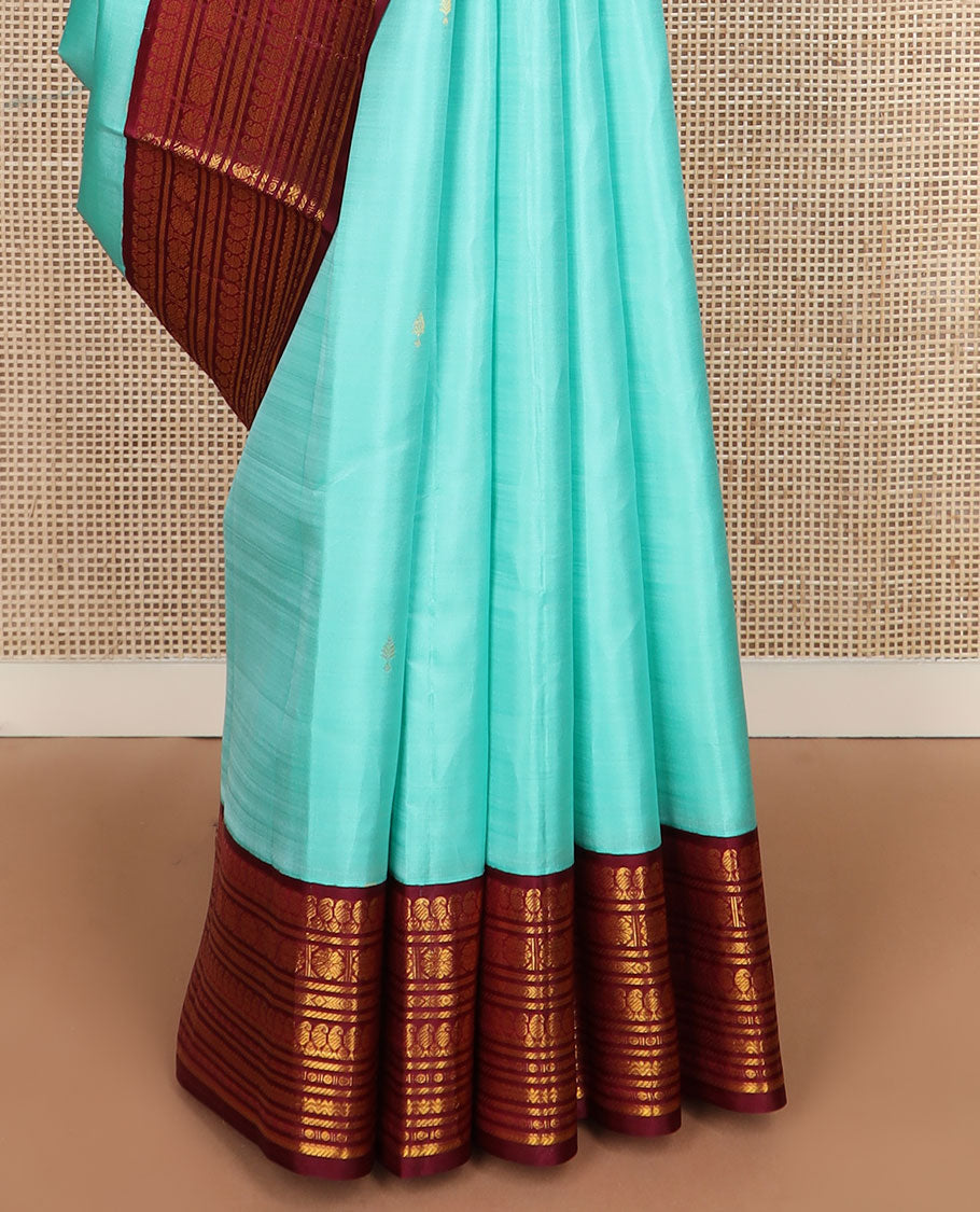 Baby blue zari buttas silk saree, contrast border of manga mokku,banaras,kamalam & rettai neli & jaal pallu