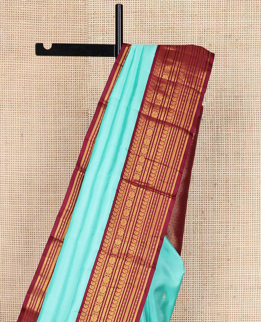 Baby blue zari buttas silk saree, contrast border of manga mokku,banaras,kamalam & rettai neli & jaal pallu