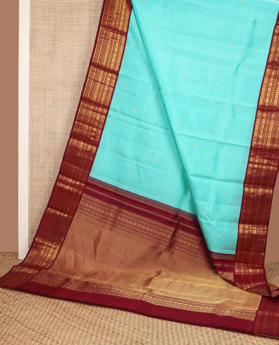 Baby blue zari buttas silk saree, contrast border of manga mokku,banaras,kamalam & rettai neli & jaal pallu