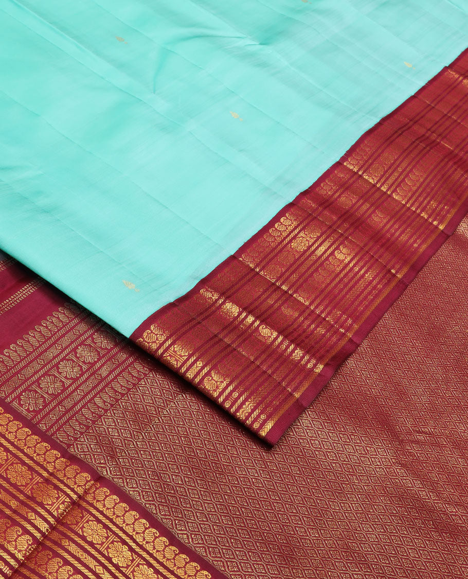 Baby blue zari buttas silk saree, contrast border of manga mokku,banaras,kamalam & rettai neli & jaal pallu