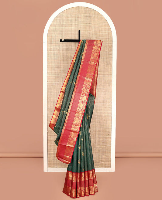 Green Vasundhara Silk Saree, Beautifully Bedecked with Zari Buttas and Checks All Over Its Body, Complemented by Contrast Border of Rekku, Muthu, and Kodi Visiry Designs, Intricately Designed Pallu, and Paired with a Contrast Blouse