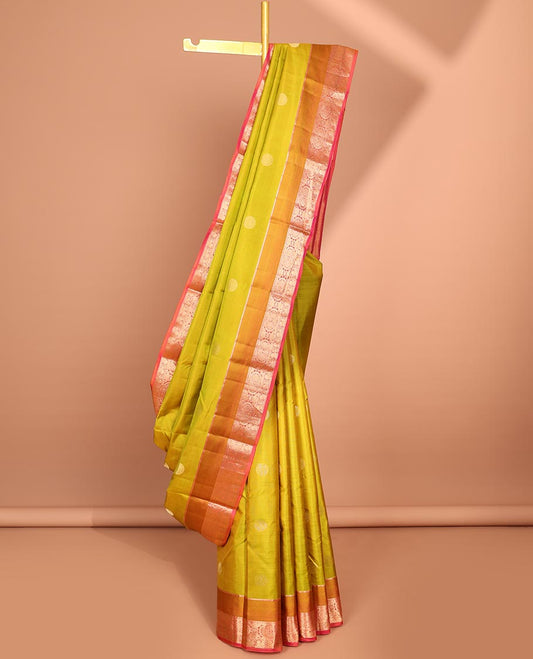 Green chakram buttas silk saree, contrast border of chakram,mayil & mayil kann & intricate pallu