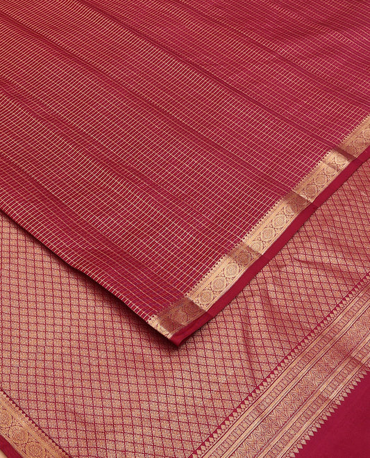 Maroon zari checked silk saree, zari-enriched pallu of jaal design & zari border of thilakam mokku & poo chakram design