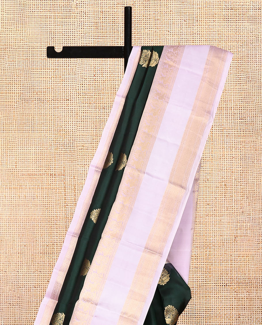 Green Vasundhara Silk Saree, Adorned with Zari Buttas, Contrast Rettai Pettu Border of Mayil, Muthu, Kamalam, and Mayil Kann Designs, Grand Pallu, and Contrast Blouse