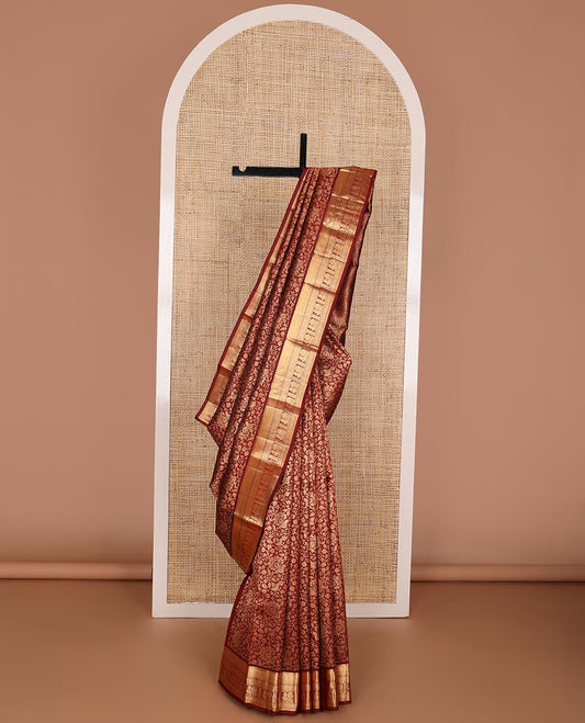 Maroon floral jacquard kanchipuram wedding silk saree, zari border of thilakam, mayil kann, diamond & annapakshi & intricate zari design weave pallu