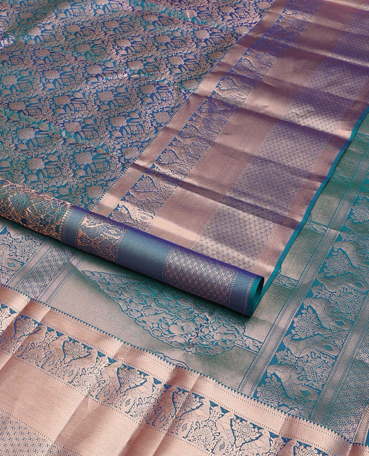 Blue jacquard wedding silk saree, zari border of rekku,Muthu,kazhugu & jaal design & pallu of animal motifs in zari