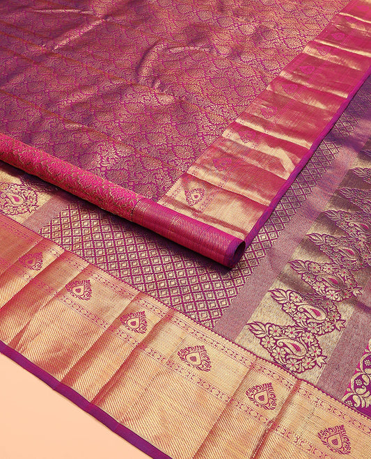 Magenta jacquard kanchipuram silk saree, zari border of thilakam, banaras, muthu, rudraksham designs, and jaal pallu