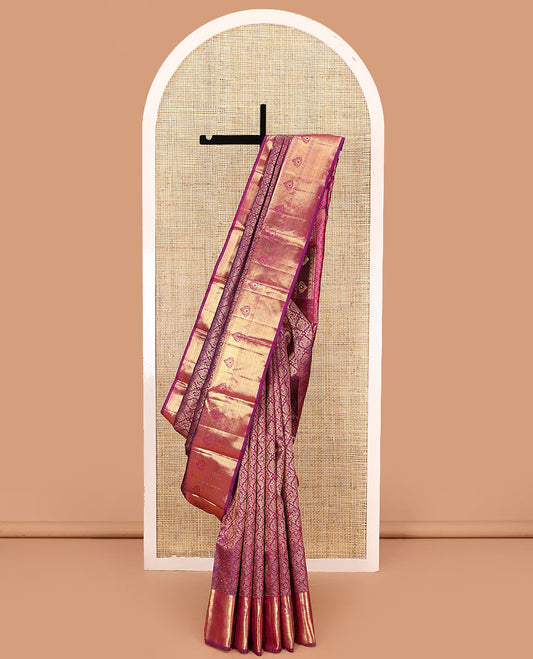 Magenta jacquard kanchipuram silk saree, zari border of thilakam, banaras, muthu, rudraksham designs, and jaal pallu