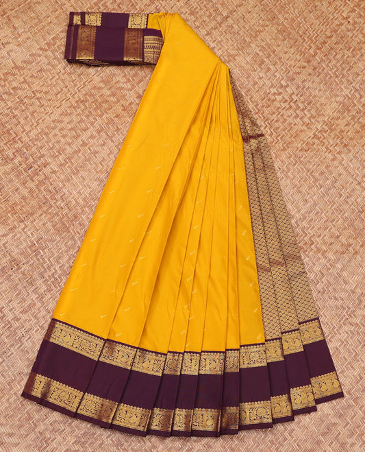 Yellow Budget Silk Saree, Sparsely Sparkled with Zari Buttas All Over Its Body, Complemented by a Contrast Traditional Zari Design Rettai Pettu Border, Grand Jaal Pallu, and Paired with a Contrast Blouse