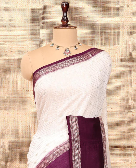 Cream Assam Silk Saree, Impeccably Styled with Zari Stripes, Complemented by a Contrast Traditional Zari Border, Zari-Striped Pallu, and a Contrast Blouse