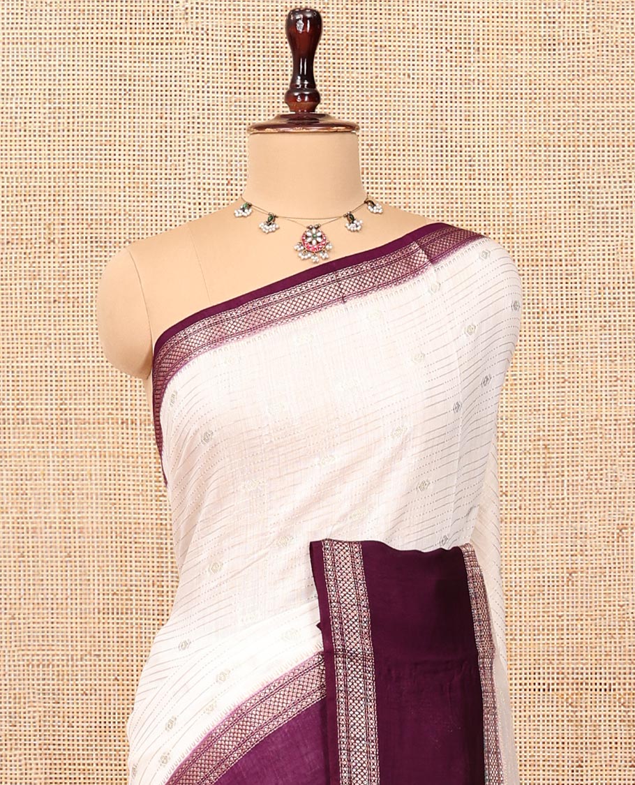 Cream Assam Silk Saree, Impeccably Styled with Zari Stripes, Complemented by a Contrast Traditional Zari Border, Zari-Striped Pallu, and a Contrast Blouse