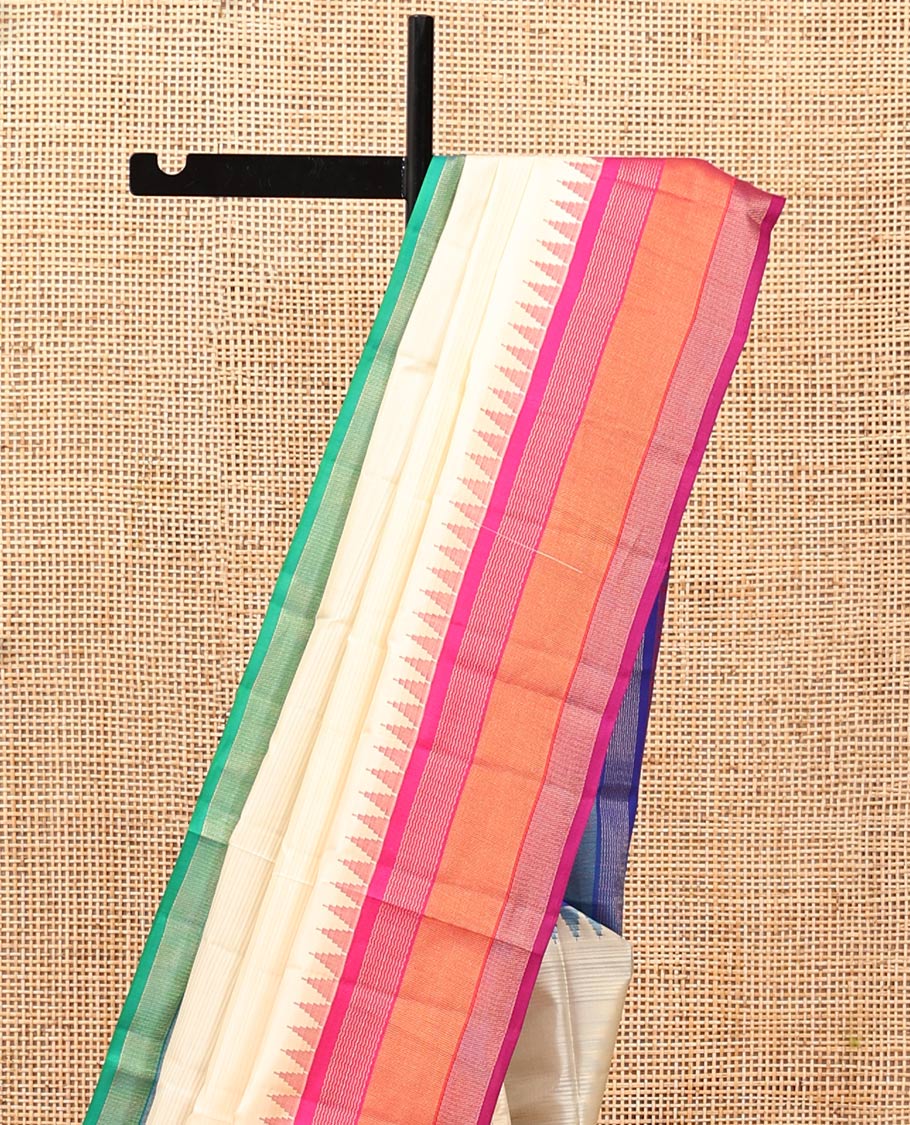 Cream-Striped Bangalore Silk Saree, Complemented by a Contrast Temple Ganga-Jamuna Border, Pallu of Temple and Neli Designs, and a Contrast Blouse