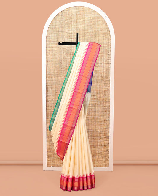 Cream-Striped Bangalore Silk Saree, Complemented by a Contrast Temple Ganga-Jamuna Border, Pallu of Temple and Neli Designs, and a Contrast Blouse