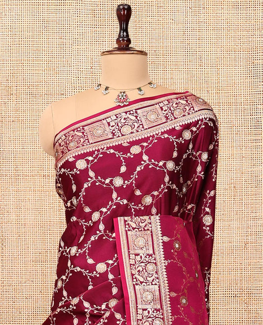 Rani Pink Wine Banarasi Satin Saree, Decked Up with Floral Jaal Jacquard, a Floral Creeper Border, Intricate Stonework Pallu, and a Matching Blouse