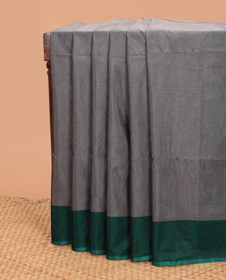 Grey plain semi-silk cotton saree, contrast plain border, and pallu
