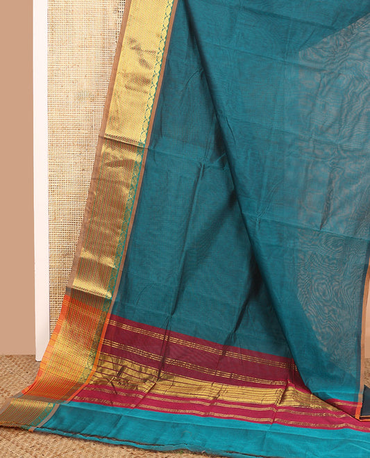 Blue plain Venkatagiri cotton saree with contrast traditional zari border, and pallu of zari stripes