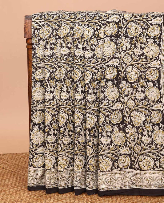 Black floral vine machine-printed Kalamkari cotton saree, geometric printed border, and pallu of intricate print