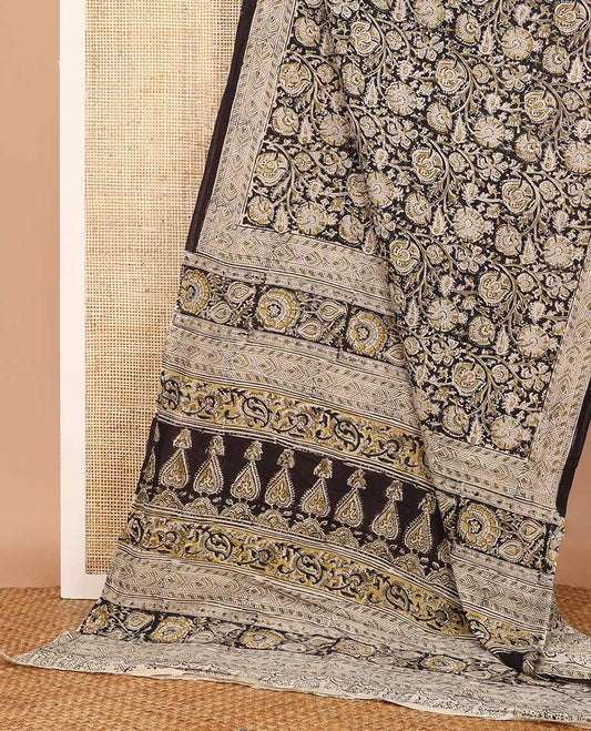 Black floral vine machine-printed Kalamkari cotton saree, geometric printed border, and pallu of intricate print
