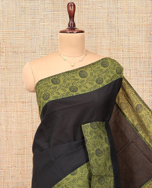 Black Plain Poly Cotton Saree, Complemented by a Contrast Floral-Printed Border, Pallu, and a Contrast Blouse