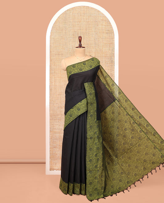 Black Plain Poly Cotton Saree, Complemented by a Contrast Floral-Printed Border, Pallu, and a Contrast Blouse