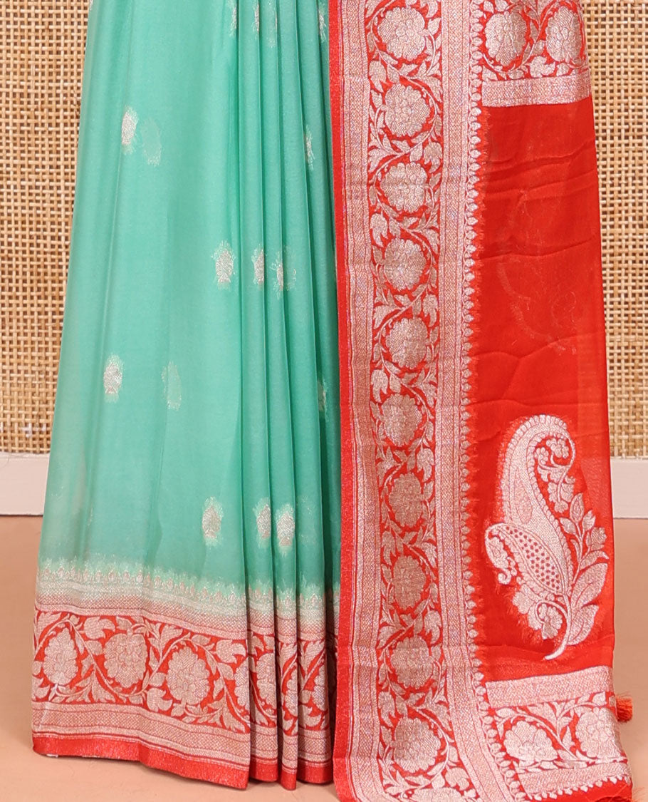 Green Banarasi Georgette Saree, Adorned with Zari Buttas All Over Its Body, Complemented by a Contrast Floral Creeper Design Border, Pallu of Paisleys, and Paired with a Contrast Blouse