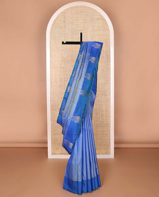 Blue buttas kancheepuram silk saree with contrast floral design border & floral motifs pallu