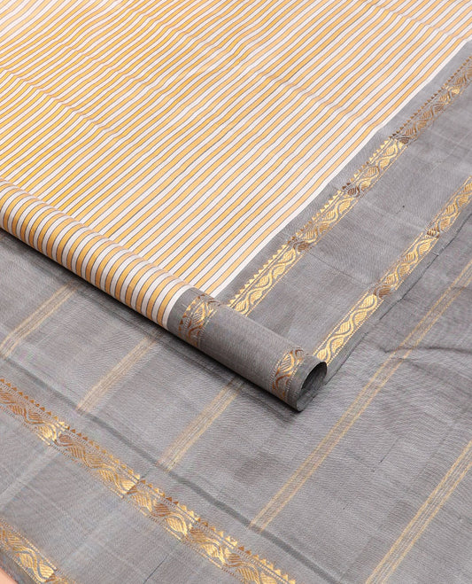 Yellow-white striped kanchipuram silk saree, contrast rettai pettu border of rekku, muthu & leaf vine & pallu of zari stripes