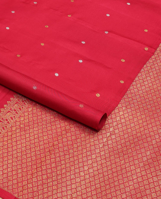 Borderless red poun buttas Kanchipuram silk saree, self-pallu of thilakam mokku, muthu, yaanai & jaal designs