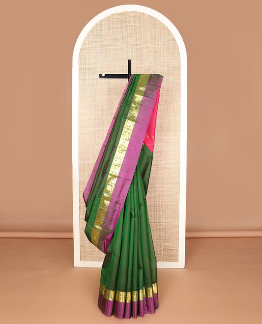 Green dual-tone zari buttas silk saree, contrast border of salngai, rudraksham,vanki & mayil & zari design pallu