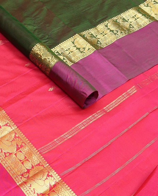 Green dual-tone zari buttas silk saree, contrast border of salngai, rudraksham,vanki & mayil & zari design pallu