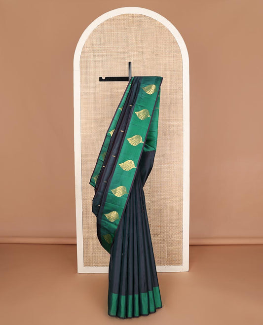 Blue zari buttas Kanchipuram silk saree, contrast leaf motifs zari border, and floral zari design pallu