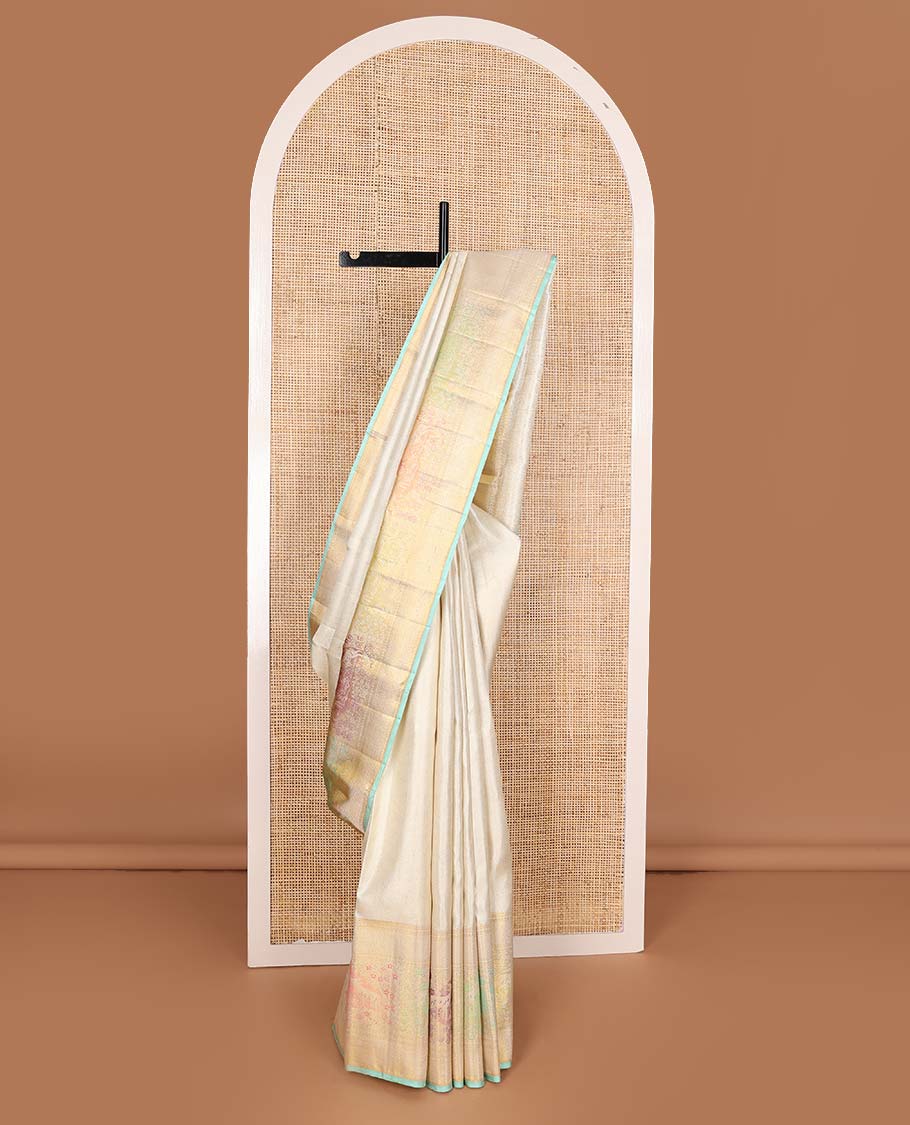 Cream jacquard Kanchipuram silk saree, zari border of mayil kann, and meenakari maan designs, and geometric pallu