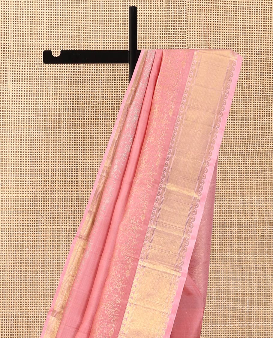 Pink floral motifs woven Kanchipuram designer saree, zari border, and zari-rich jaal pallu