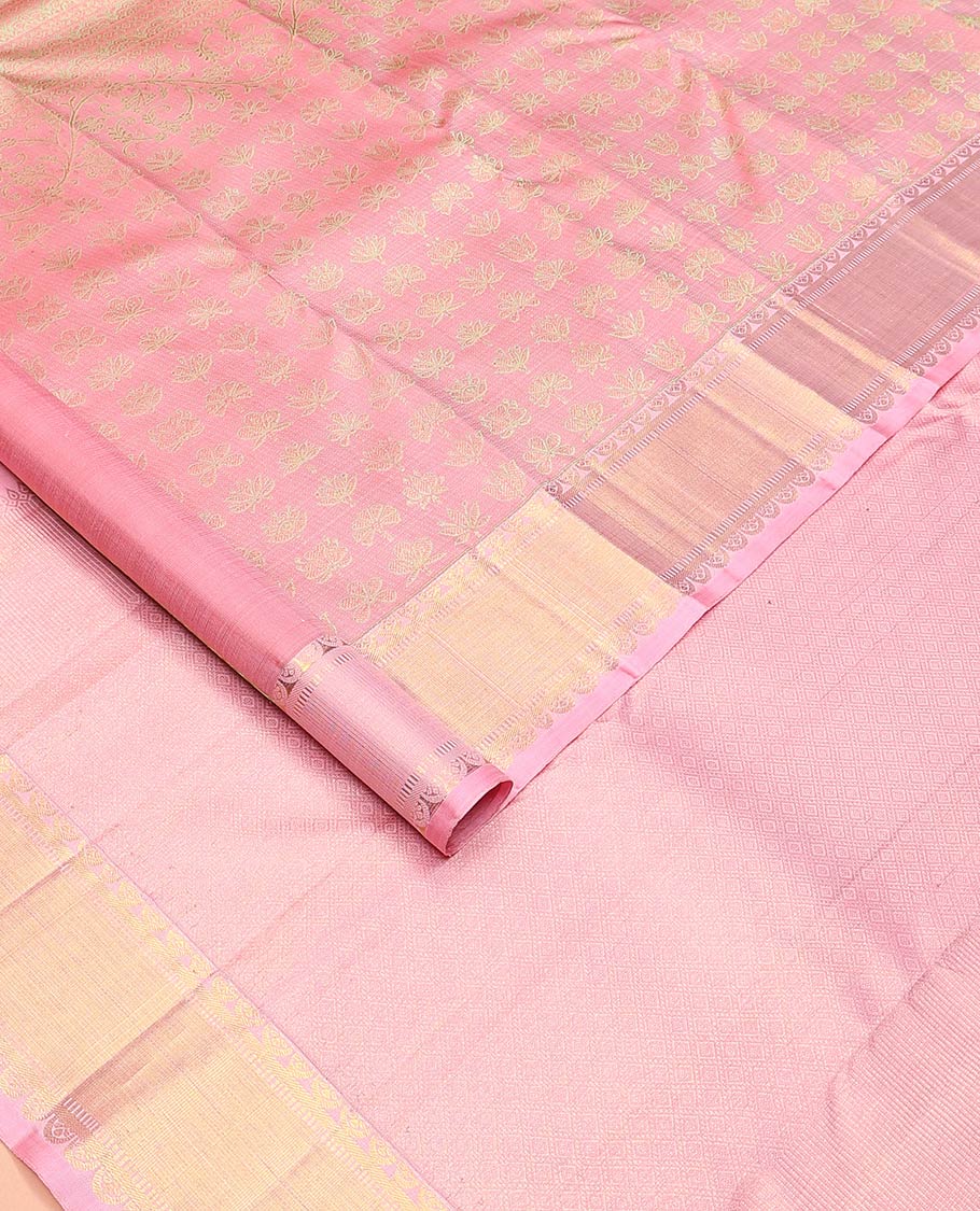 Pink floral motifs woven Kanchipuram designer saree, zari border, and zari-rich jaal pallu