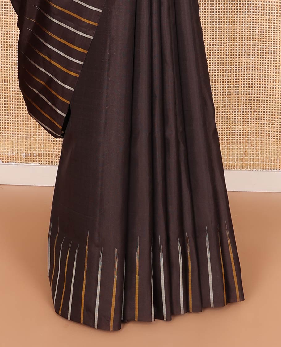 Broderless brown soft silk saree, pallu of thilakam mokku, paisa, kodi visiry, and jaal design