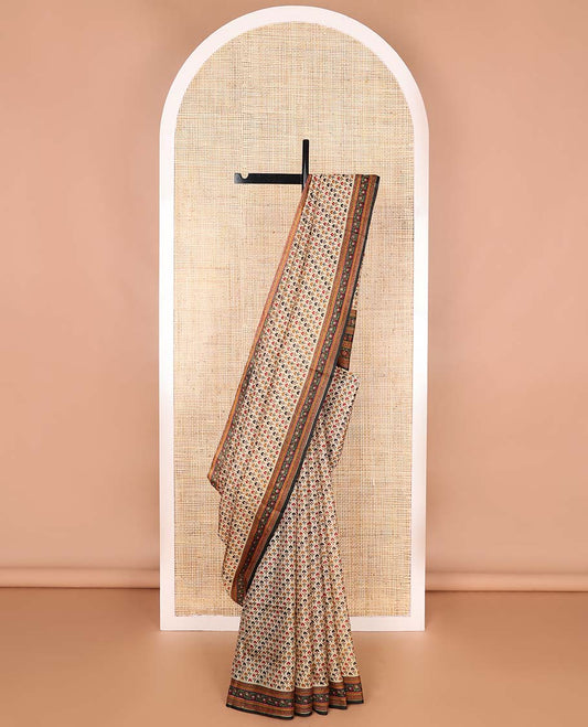 Pale brown leaf design printed silk saree with contrast floral design border & floral design pallu