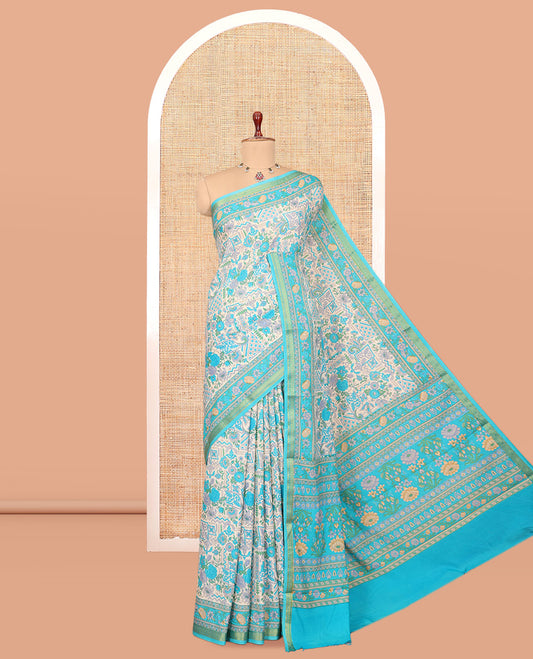 Blue Printed Silk Saree, Embellished with Intricate Floral Print, a Traditional Zari Border, Floral Pallu, and a Matching Blouse