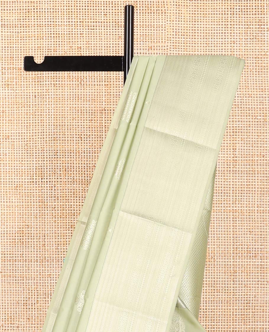 Mint green tree motifs vasundhara elite silk saree with self intricate zari design border & vanki design pallu