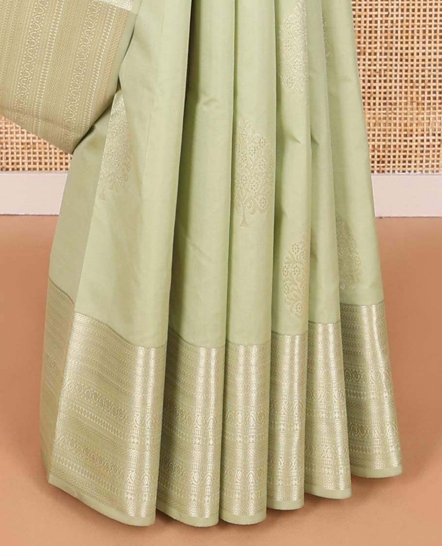 Mint green tree motifs vasundhara elite silk saree with self intricate zari design border & vanki design pallu