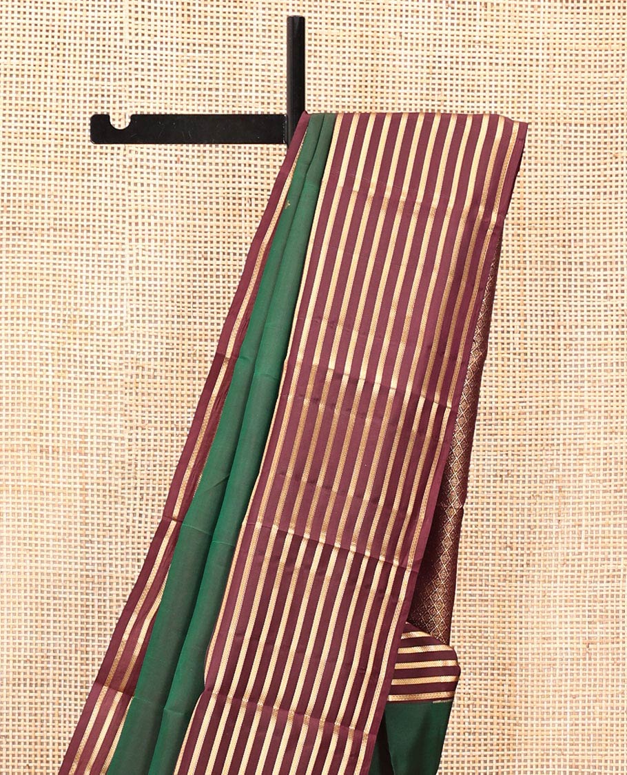 Green Vasundhara Lite Silk Mix Saree, Beautifully Bedecked with Zari Buttas All Over Its Body, Complemented by a Contrast Zari Striped Border, Grand Jaal-Design Pallu, and Paired with a Contrast Blouse