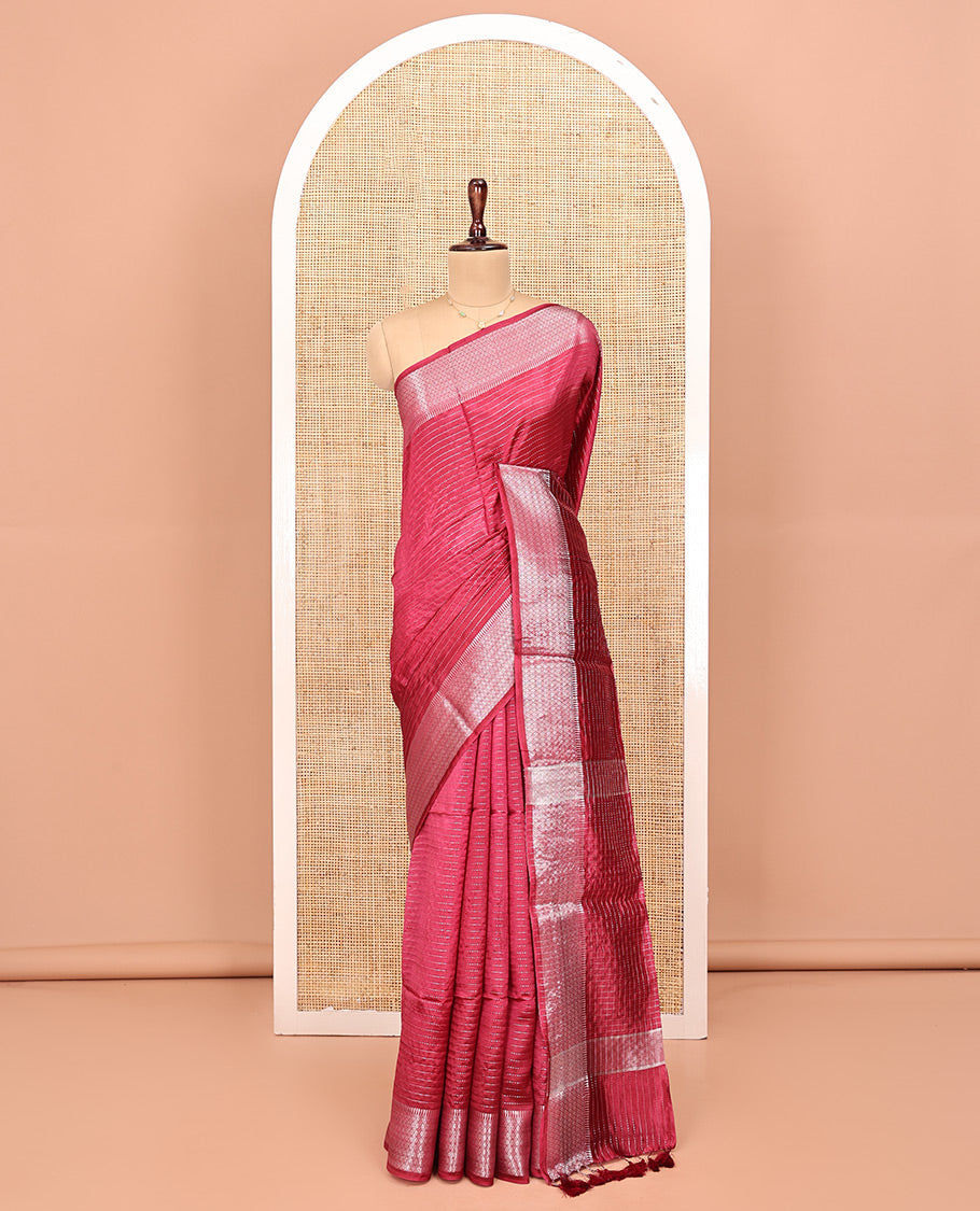Red Banana Pith Saree, Elevated with Zari Stripes All Over Its Body, Highlighted by Temple Border of Jaal Designs, Subtly Striped Pallu, and Paired with a Matching Blouse