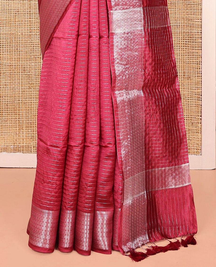 Red Banana Pith Saree, Elevated with Zari Stripes All Over Its Body, Highlighted by Temple Border of Jaal Designs, Subtly Striped Pallu, and Paired with a Matching Blouse