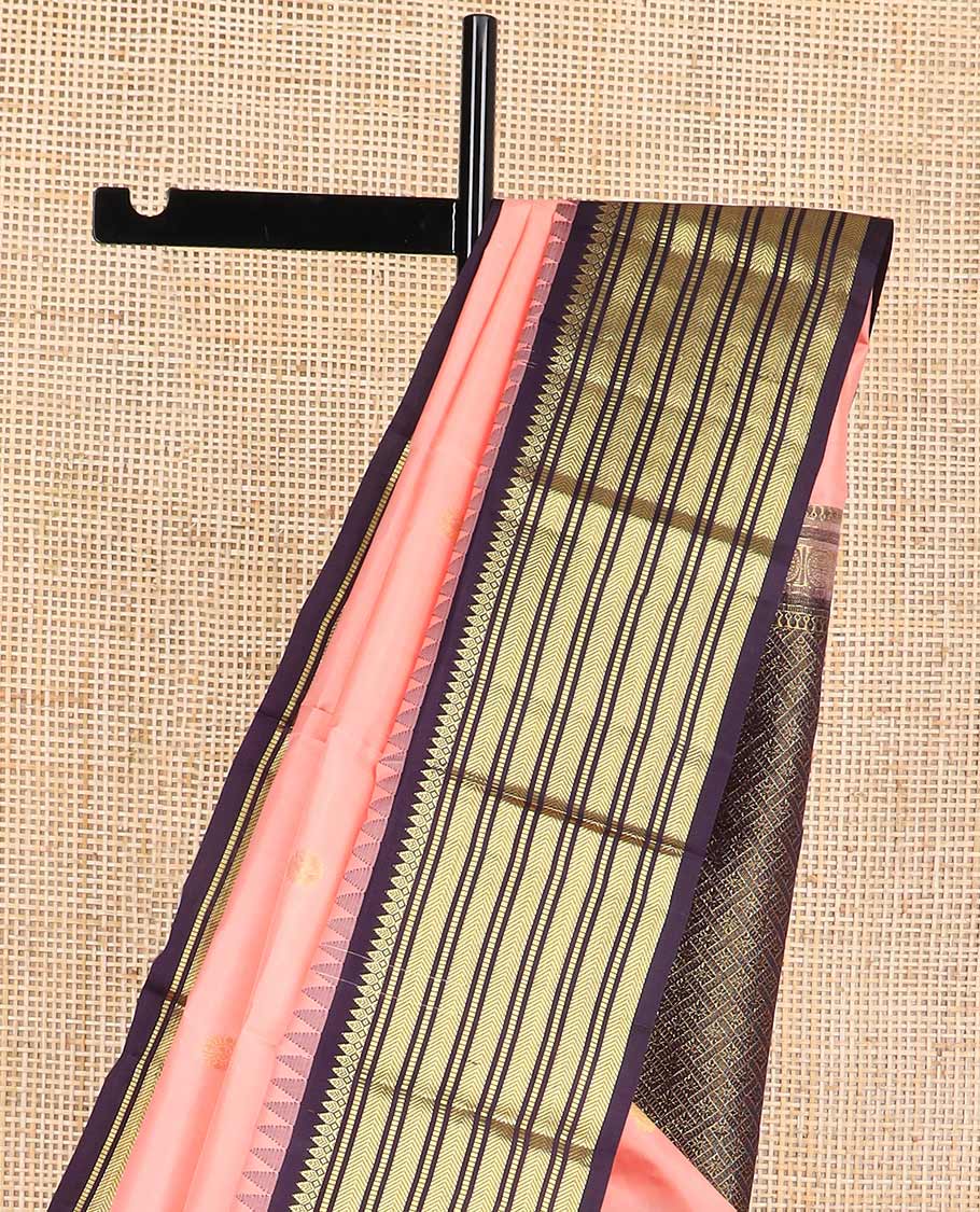 Peach buttas silk saree with contrast border of rekku, thilakam mokku, muthu, kathir design & floral enclosed checked design pallu