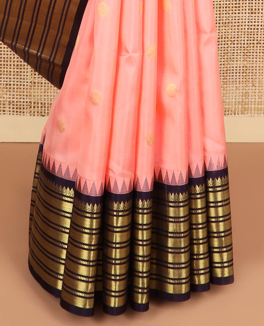 Peach buttas silk saree with contrast border of rekku, thilakam mokku, muthu, kathir design & floral enclosed checked design pallu