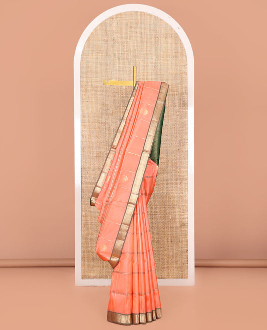 Peach Vasundhara Silk Saree, Mesmerized with Zari Butta Enclosed Checks, Complemented by a Contrast Border of Thilakam Mokku, Neli, Banaras, Muthu, and Mayil Kann Designs, Pallu Depicting Geometric Designs, and Paired with a Contrast Blouse